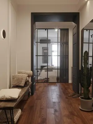 a living room with a couch and a cactus at Mibu Apartments in Belgrade