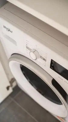a white microwave oven with its door open at HostGost Selected Suites - Skadarlija Artisan in Belgrade