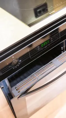 a close up of an oven with a clock on it at HostGost Selected Suites - Skadarlija Artisan in Belgrade