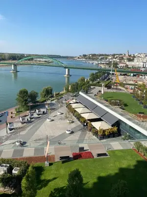 an overhead view of a park next to a river at BW Residences - Belgrade Waterfront in Sajmište