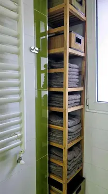 a towel rack with towels in a bathroom at Apartment 10 in Belgrade