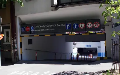 a building with a sign for a gas station at Apartment Square 59 Belgrade center in Belgrade