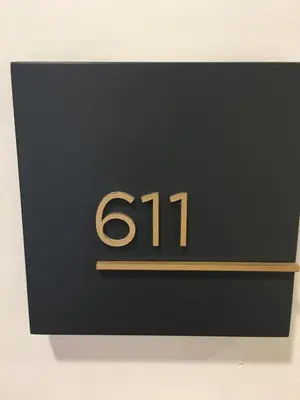 a black plaque with the number on it at Belgrade Waterfront - Verde Studio in Sajmište