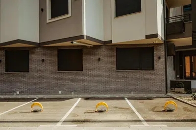 a parking lot in front of a building at TOP VIEW apartment 47 in Arandjelovac