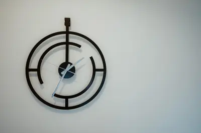 a black and white clock on a white background at TOP VIEW apartment 40 in Arandjelovac