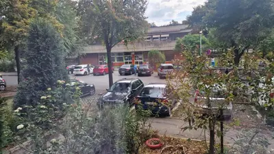 a group of cars parked in a parking lot at Fontana in Belgrade