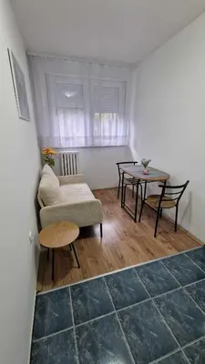 a living room with a couch and a table at Fontana in Belgrade