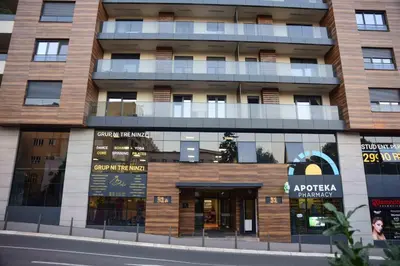 a building on a city street with a building at Dreams Hill Studio in Čukarica