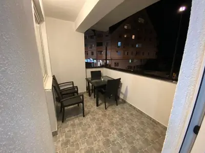 a view of a balcony with a table and chairs at Crystal Apartman Obrenovac in Obrenovac
