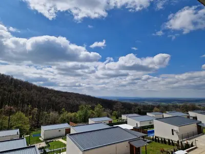 an aerial view of a cluster of buildings and trees at Kosmaj Renew - Sunset View in Koraćica
