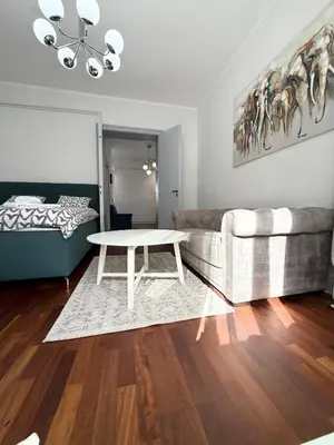 a living room with a couch and a table at Apartment A3, Center, Belgrade in Belgrade