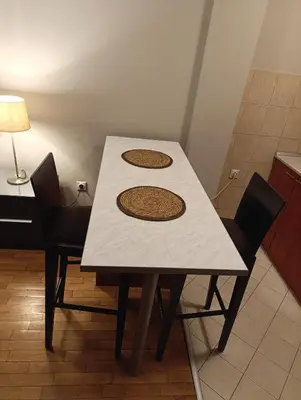 a table with two mats on top of it at Moka in Belgrade