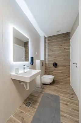 a bathroom with a sink and a toilet at Dark Nest 3 Belgrade Apartments in Zvezdara