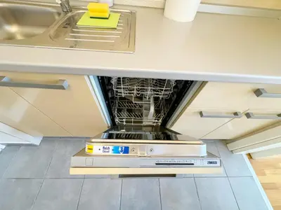 an oven with a dish rack in a kitchen at Apartment B5 in Belgrade