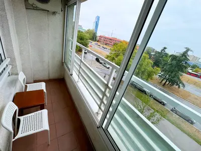 a room with a window with a view of a street at Apartment B5 in Belgrade