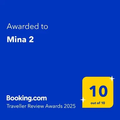 a yellow box with the text awarded to minima at Mina 2 in Belgrade