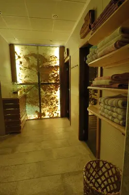 a room with a hallway with a glass door at Green Land Club in Novi Banovci