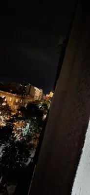 a view of a city at night with buildings at Apartman Resavska in Belgrade