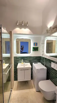 a bathroom with a toilet and a sink at Completely new, Bonbona Apartment Belgrade in Belgrade