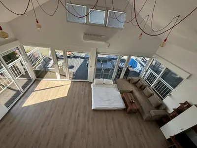 an overhead view of a living room on a yacht at Beautiful houseboat on the Sava river in Belgrade