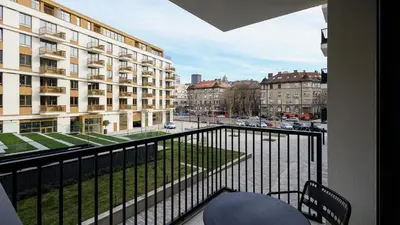 a balcony with a view of a street and buildings at Belgrade Waterfront Quartet 1 in Belgrade