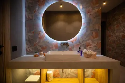 a bathroom with a sink and a mirror at Kosmaj IKIGAI in Nemenikuće