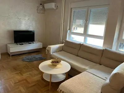 a living room with a couch and a table at Ana in Smederevo