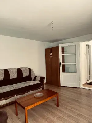 a living room with a couch and a coffee table at Stan na dan in Belgrade