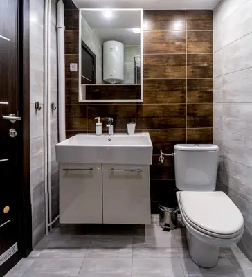 a bathroom with a toilet and a sink at Apartments King Milan, City Center in Belgrade
