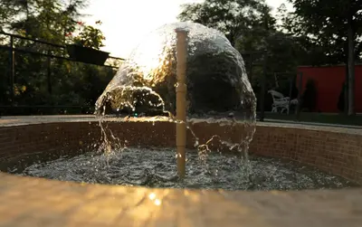 a fountain with water spewing out of it at Bed & Breakfast Garden40 in Belgrade