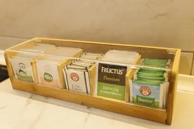 a wooden container filled with different types of food at Apartman Premijer 2 in Čukarica