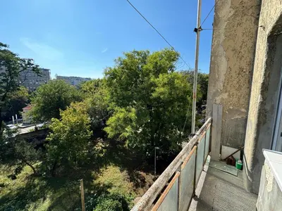 a balcony of a building with a view of trees at KALEMEGDAN Apartment - Belgrade in Belgrade