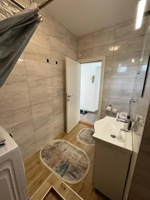 a bathroom with a sink and a toilet at KALEMEGDAN Apartment - Belgrade in Belgrade