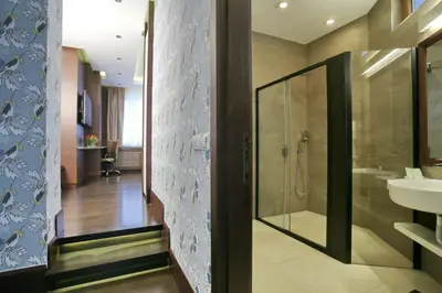 a bathroom with a shower and a sink at Belgreat Premium Suites in Belgrade