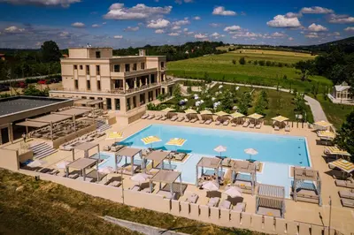 an aerial view of a resort with a swimming pool at Hyde Hill Kosmaj in Sopot