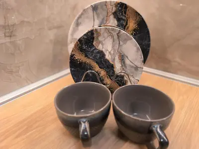 two bowls sitting on top of a wooden table at Apartman Viktor in Surčin