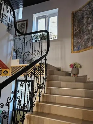 a stairway with a potted plant on top of it at VANSVEL Boutique Apartment 14 in Belgrade