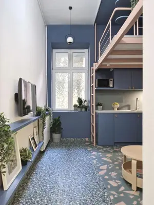 a kitchen with blue walls and a blue floor at Studio MAXIM in Vračar (historical)