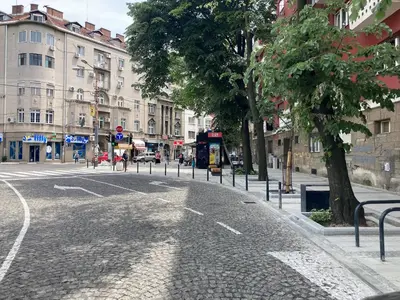 an empty street in a city with buildings at Studio MAXIM in Vračar (historical)
