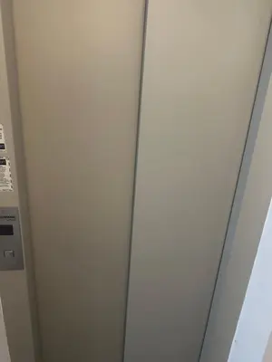 a close up of a door in an elevator at xenija in Belgrade