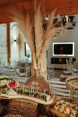 a table with a buffet of food in a room at Casa del Corniolo Spa and Pool House Fruška gora in Čortanovci