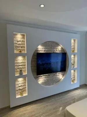 a room with two windows and a television on a wall at Apartman City Zeleznik in Belgrade