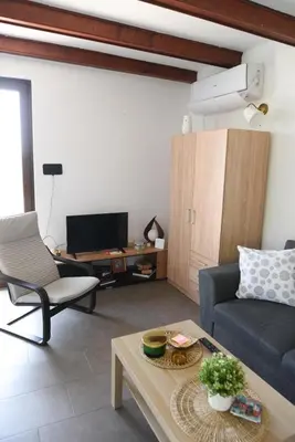 a living room with a couch and a table at View Point House in Smederevo