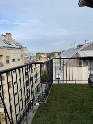 a balcony with a view of some buildings at Apartment Sofia in Belgrade