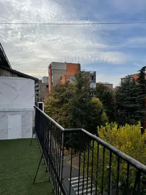 a balcony with a view of a city at Apartment Sofia in Belgrade