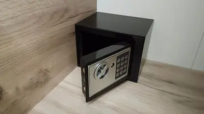 a microwave oven sitting on top of a floor at Eden Spa Apartman in Arandjelovac