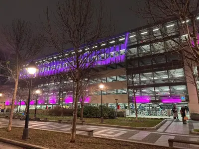 a building with purple lights on the side of it at BD Old Town Suite - Pedestrian Zone - City Center in Belgrade