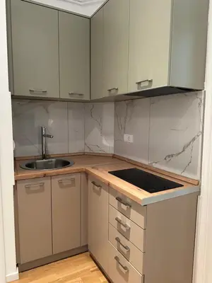 a kitchen with a sink and a counter top at City Centre Retreat Palmoticeva Studio in Belgrade