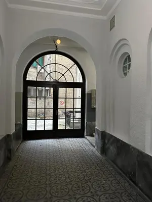 an entrance to a building with a large door at City Centre Retreat Palmoticeva Studio in Belgrade