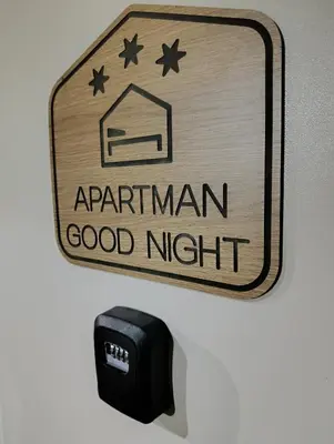 a sign on a wall that reads elephant good night at Apartman Good Night in Surčin